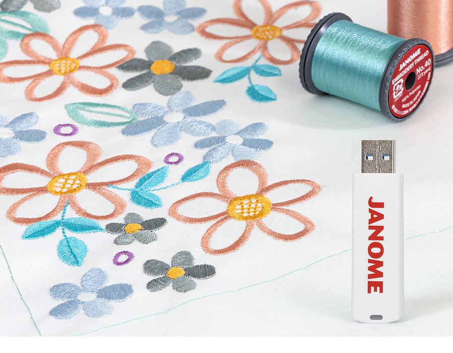 Janome Memory Craft 550E Embroidery Machine + FREE Beginner Software