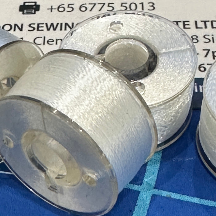 Pre-wound Bobbin 11.5mm, Embroidery Thread, 75D/2. Closeup Photos