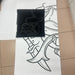 A black fabric with a white Sashiko Stitches outlined showing the matching sketch on the paper.
Done by BabyLock Sashiko BLQK Sewing Machine | Traditional Japanese Hand Stitch Machine. 