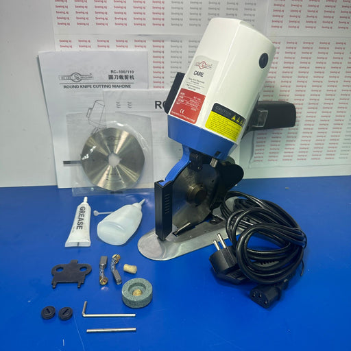 SU LEE RC-100; 4 inch Blade Rotary cutting machine with accessories.